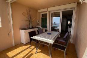 Apartment with pool and sea view